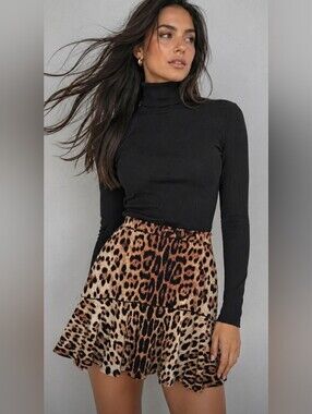 Eva Varro leopard peplum skirt